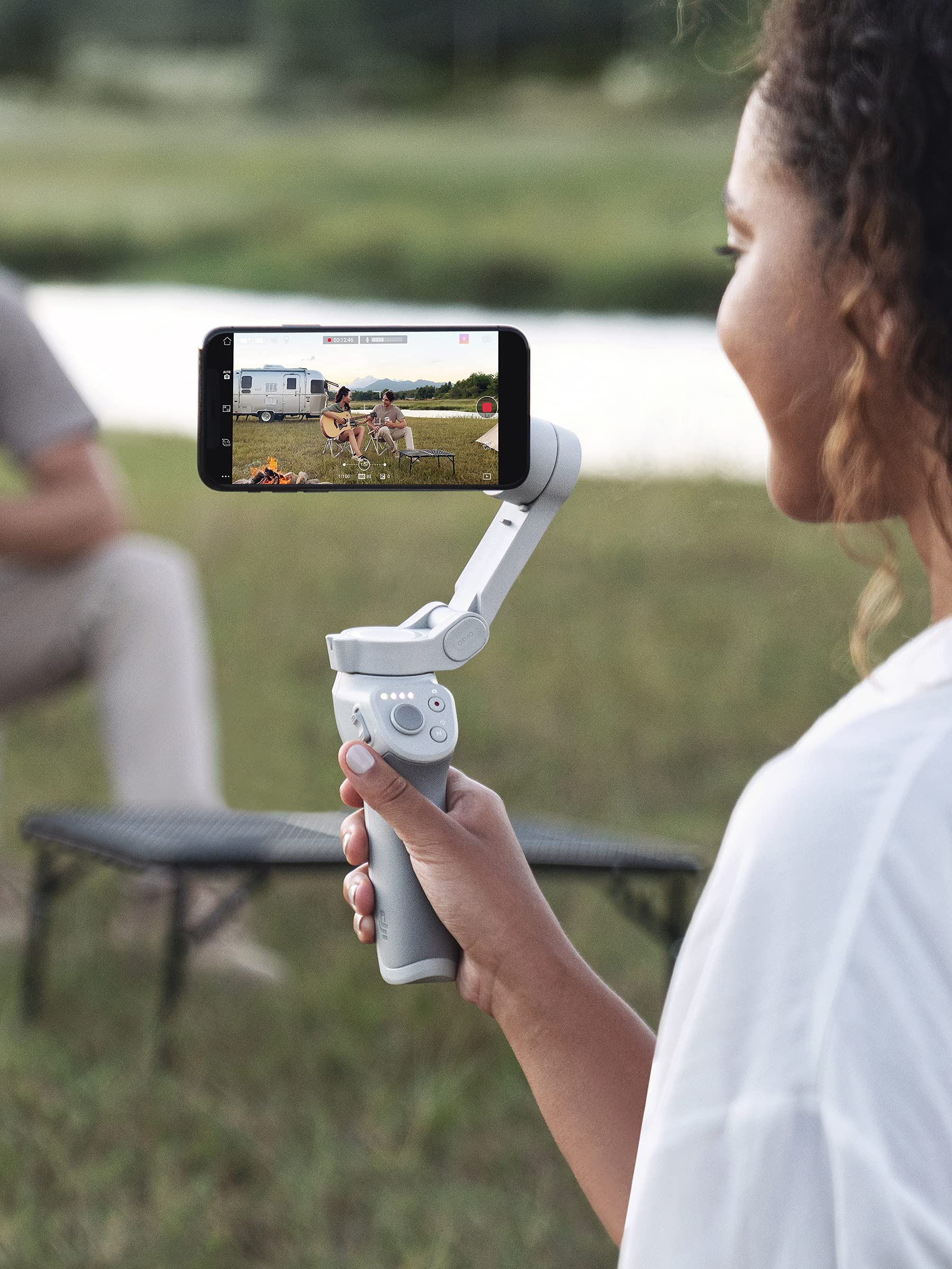 DJI OM 4 - Handheld 3-Axis Smartphone Gimbal Stabilizer with Grip, Tripod, Gimbal Stabilizer Ideal for Vlogging, YouTube, Live Video, Phone Stabilizer Compatible with iPhone and Android