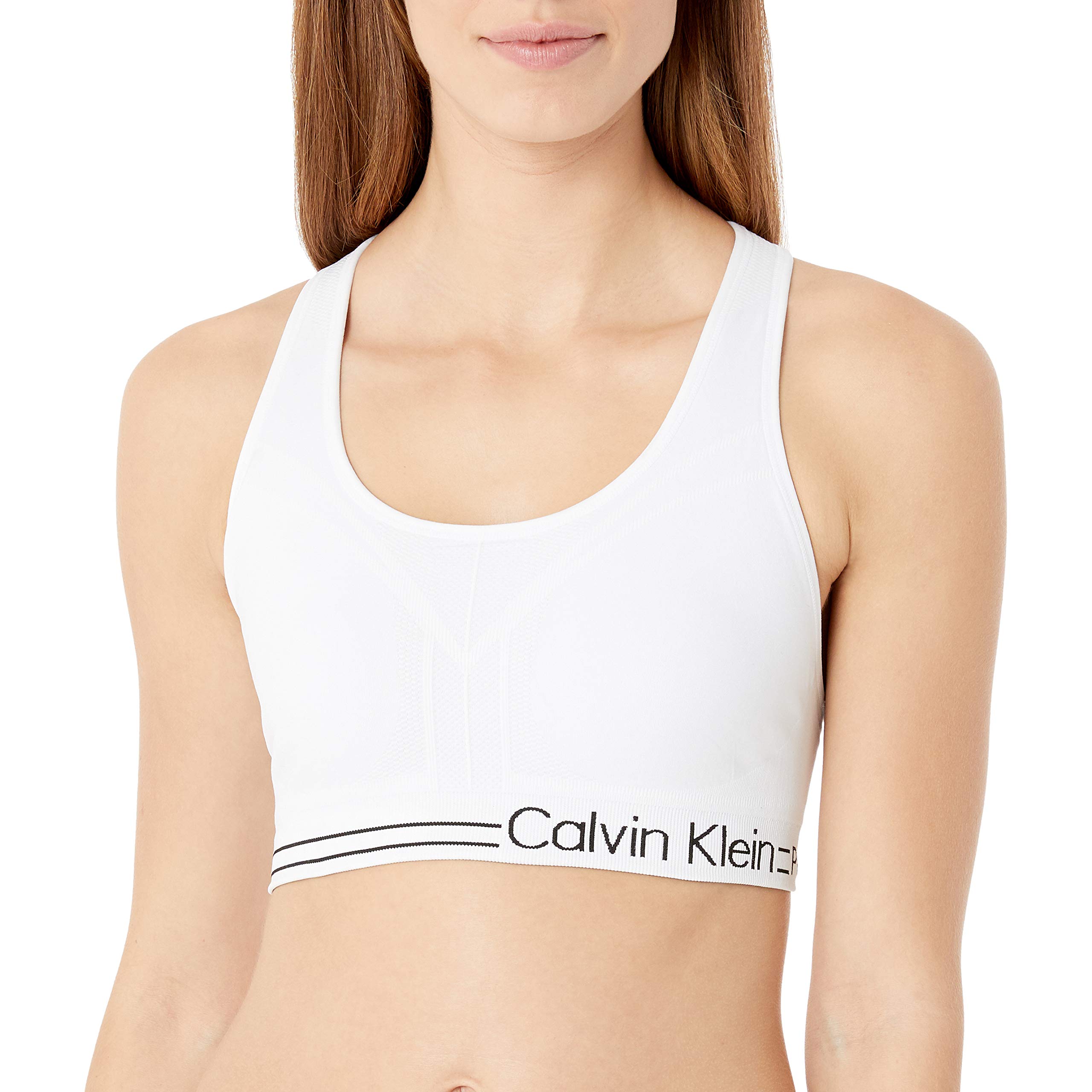 Mua Calvin Klein Women's Performance Moisture Wicking Medium Impact  Reversible Seamless Sports Bra trên Amazon Mỹ chính hãng 2022 | Fado