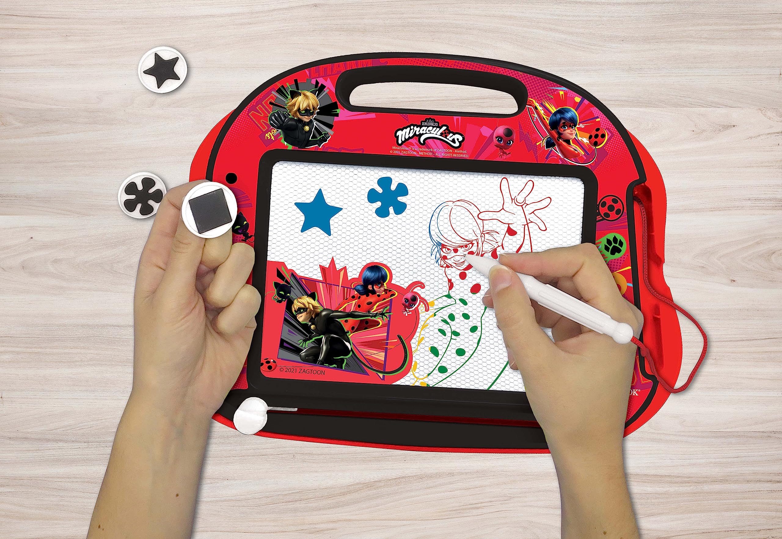 LEXiBOOK, Miraculous Ladybug Cat Noir, Multicolor Magic Magnetic Drawing Board, Artistic Creative Toy for Girls and Boys, Stylus Pen and Stamps, Red/Black, CRMI550