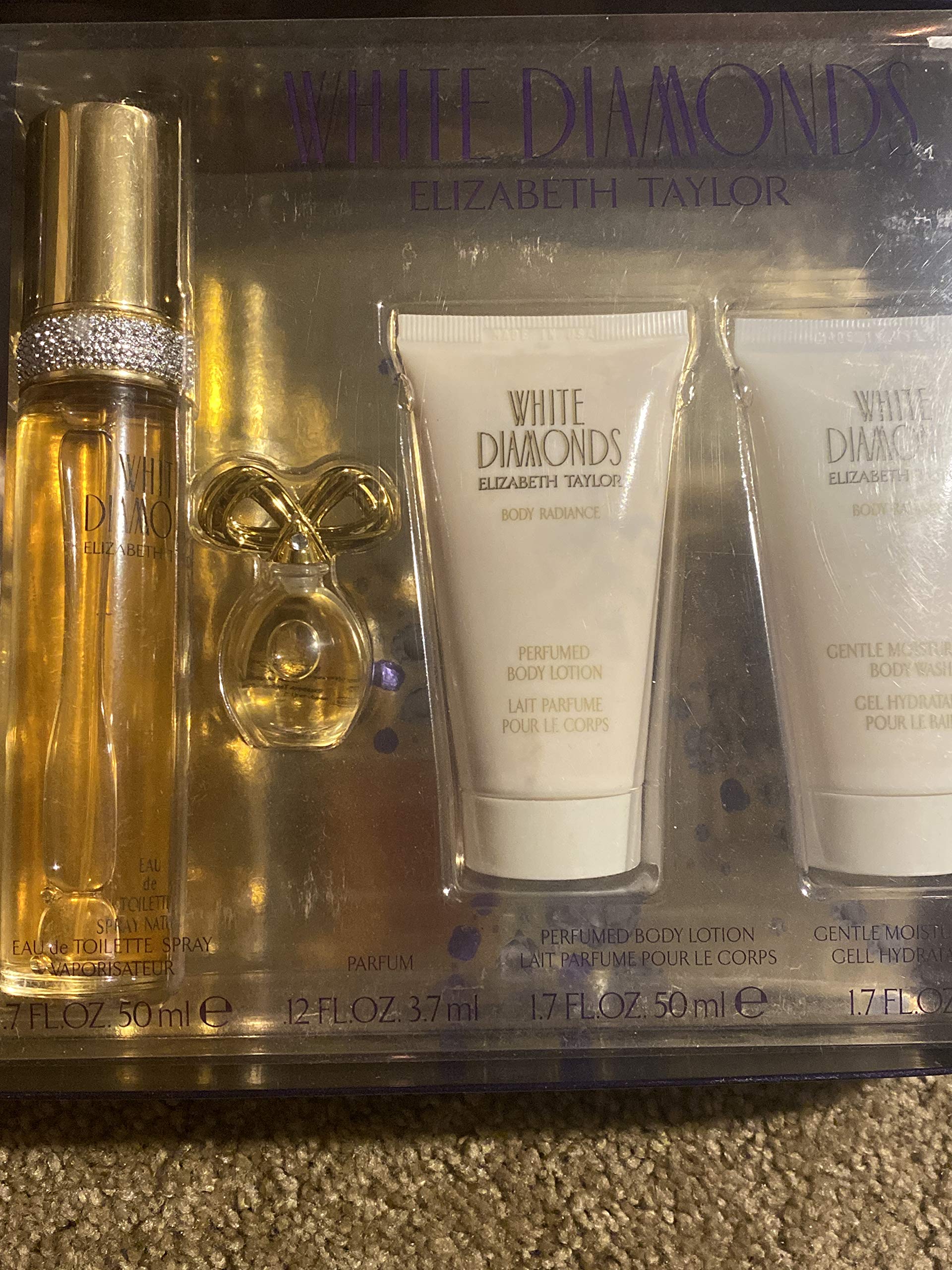 Elizabeth Taylor's White Diamonds 4 Pc Gift Set for Women Includes 1.7 Oz Cologne (EDT) Spray, .12 Oz Perfume (EDP), 1.7 Oz Body Lotion, and 1.7 Oz Body Wash