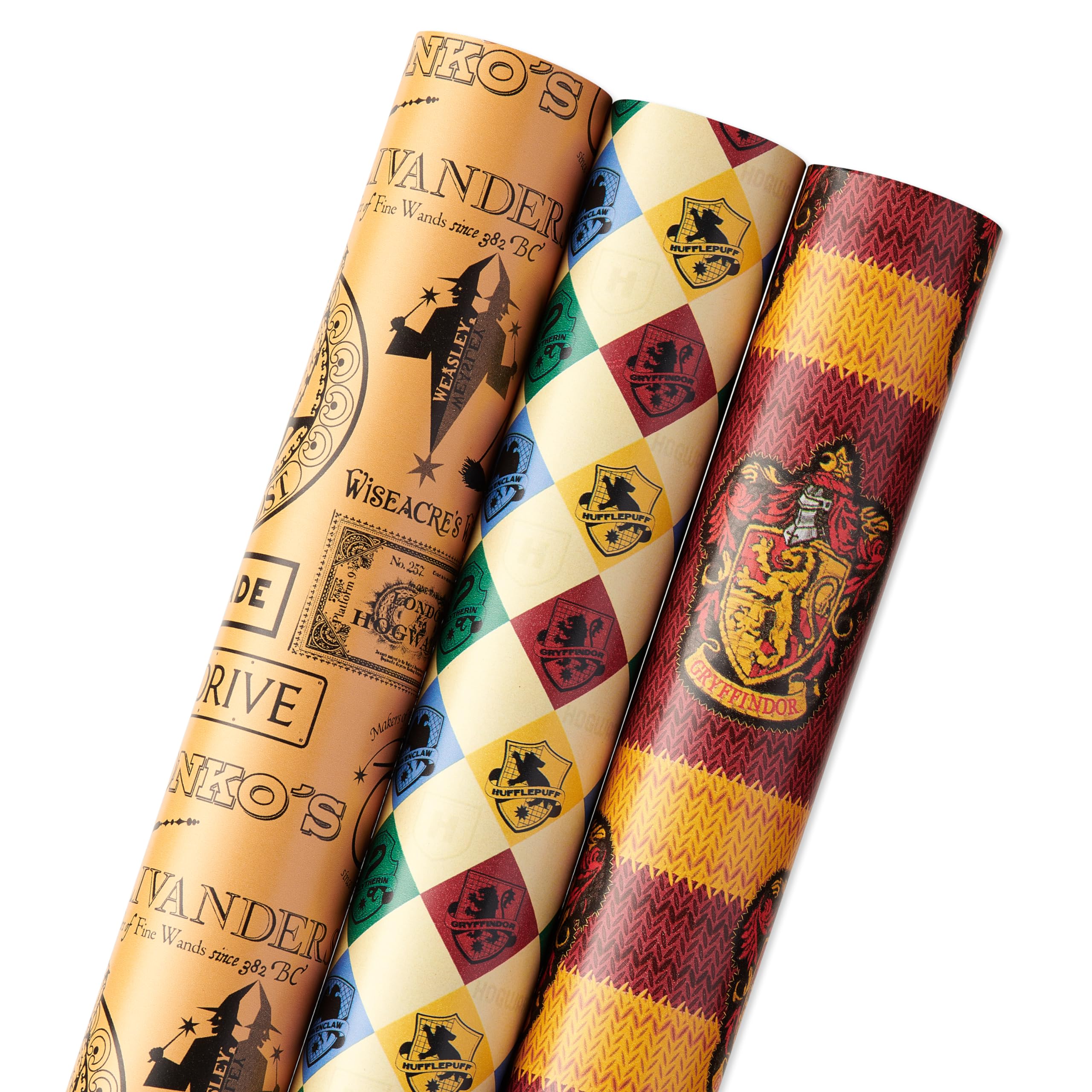 American Greetings 105 sq. ft. Harry Potter Wrapping Paper Set with Gridlines for Birthdays, Graduations and All Occasions, Hogwarts House Crests, Gryffindor Robe and Marauders Map (3 Rolls, 30 in. x 14 ft. each)