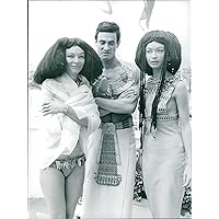 Vintage photo of Jerzy Zelnik and Barbara Brylska posing with another woman and smiling, 1966.