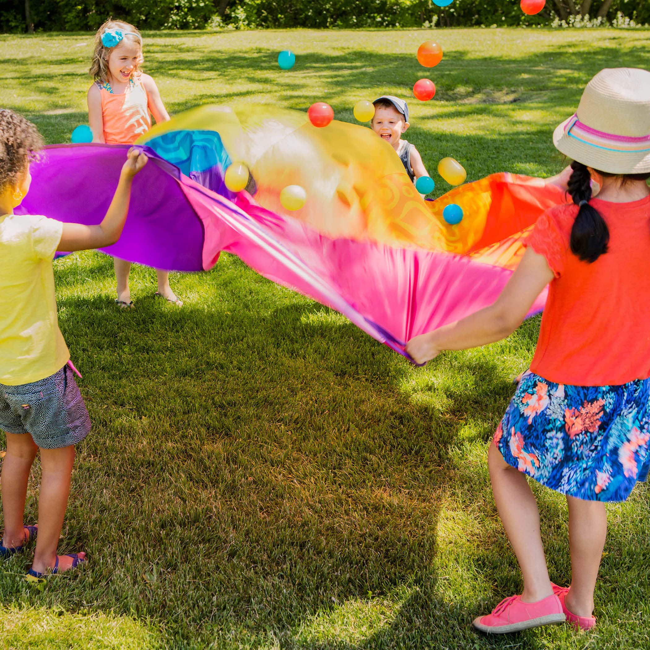 B. Toys – Parachute for Kids – Play Parachute with 15 Colorful Balls – 12 Handles – 8ft Wind Tent – Outdoor Games – Rainbow Colors – Woo-Hue Parachute! – 3 Years +