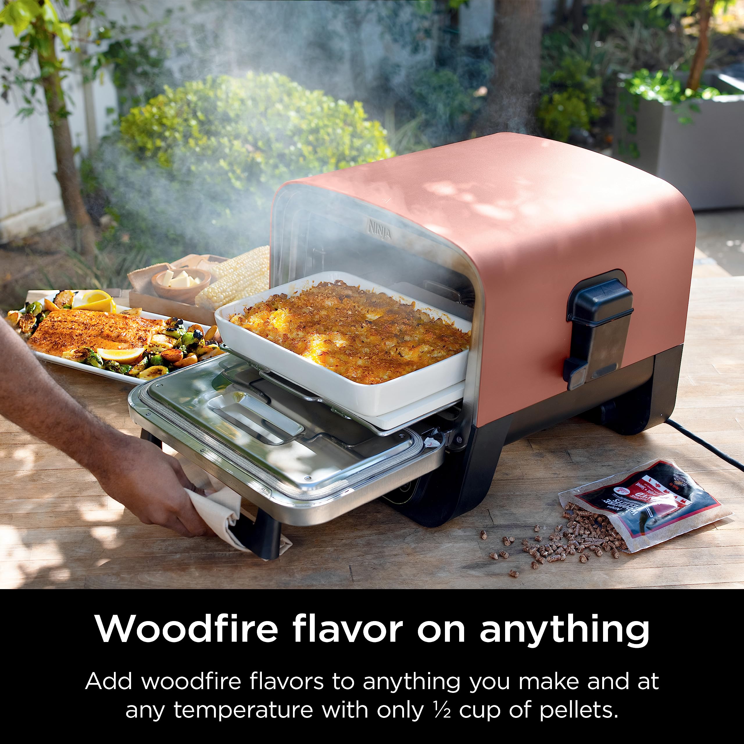 Ninja OO101 Woodfire 8-in-1 Outdoor Oven, Pizza Oven, 700°F High Heat Roaster, BBQ Smoker, Woodfire Technology, Pellets for Woodfire Flavor, Weather Resistant, Portable, Electric, Terracotta Red