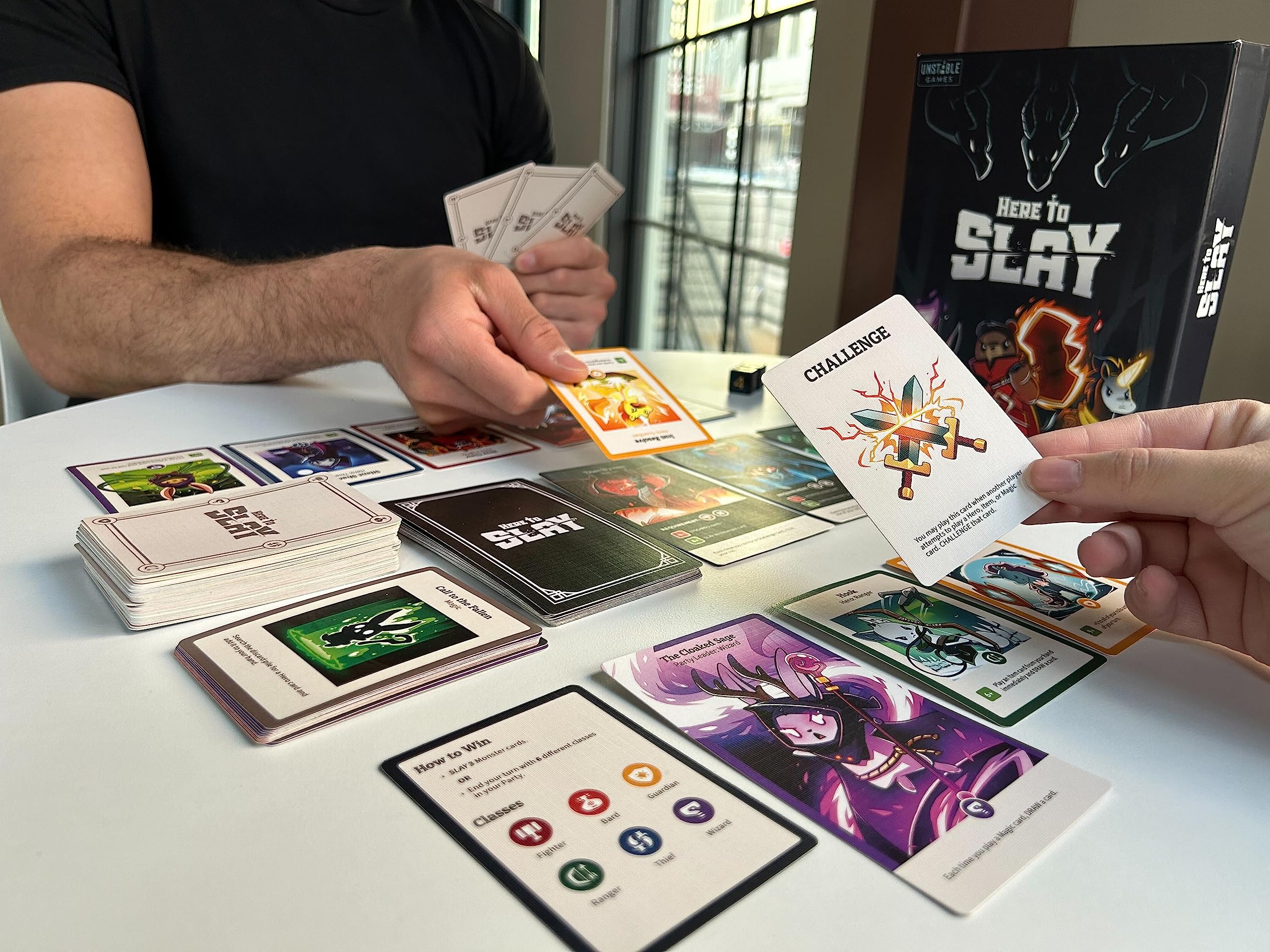 Unstable Games - Here to Slay Base Game - Strategic role playing card game for kids, teens, & adults - 2-6 players ages 10+ - Brutal and adorable adventure- Great for family game night