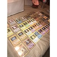 Pokémon 1st/2nd Generation from 1999! Pack of 50 Cards Guaranteed Holographics and first editions!! No more then 6 energy cards in each lot unless requesting more! Product ID: 792759981470